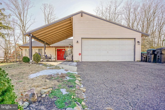 view of front facade with a carport