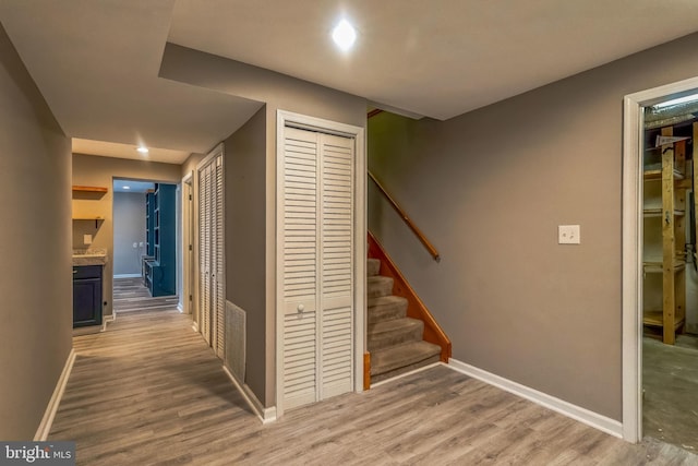 hallway featuring hardwood / wood-style floors