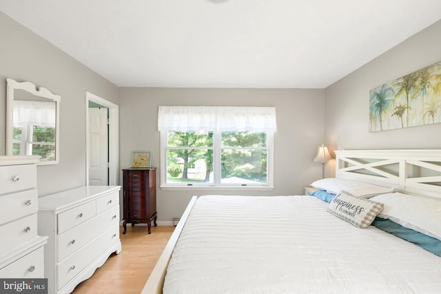 bedroom with light hardwood / wood-style flooring