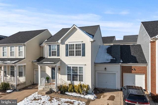 view of front of property with a garage