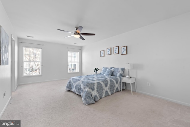 bedroom with ceiling fan and carpet