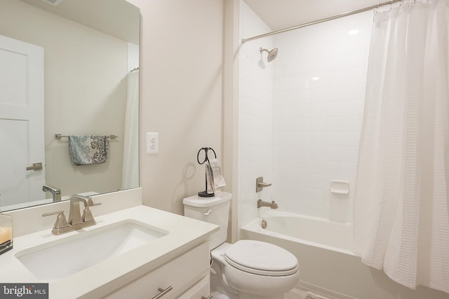 full bathroom featuring vanity, toilet, and shower / bath combo with shower curtain