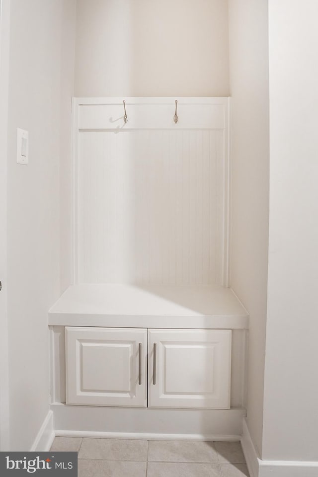 mudroom featuring light tile patterned flooring