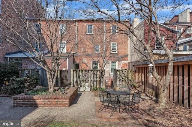 view of property's community featuring a patio