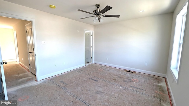 unfurnished room featuring ceiling fan