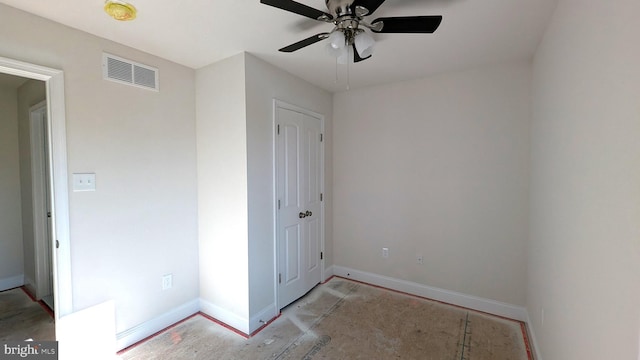 unfurnished bedroom featuring ceiling fan