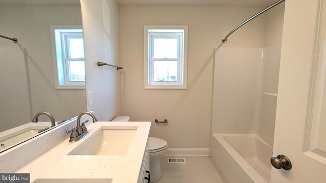 full bathroom featuring tile patterned floors, vanity, toilet, and shower / bath combination