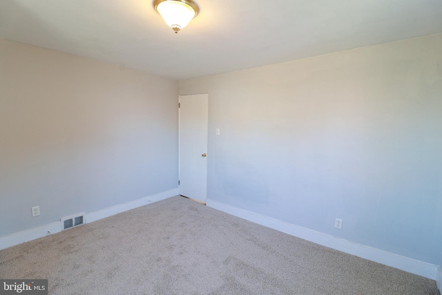 empty room featuring carpet flooring