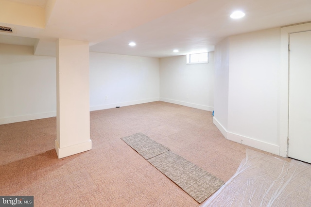 basement with light carpet