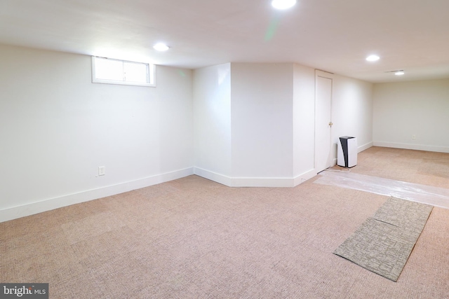 basement with light carpet