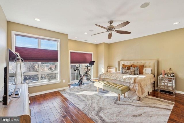 bedroom featuring dark hardwood / wood-style flooring and ceiling fan