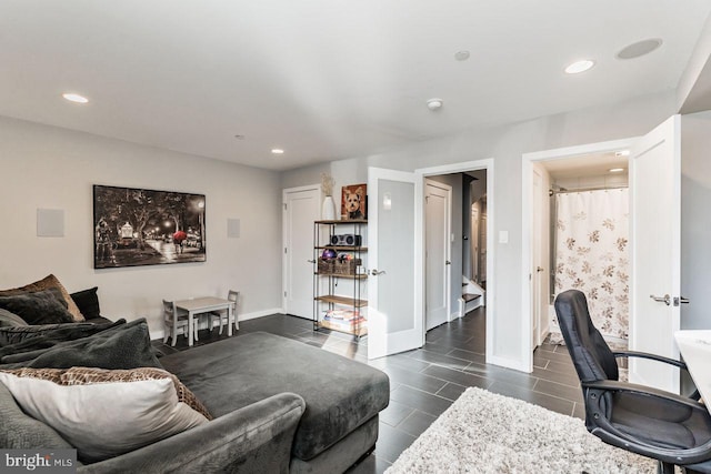 living room with dark tile patterned flooring