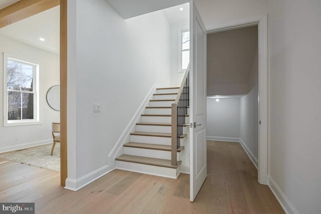 stairway with wood-type flooring