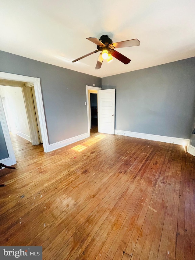 unfurnished bedroom featuring light hardwood / wood-style flooring and ceiling fan