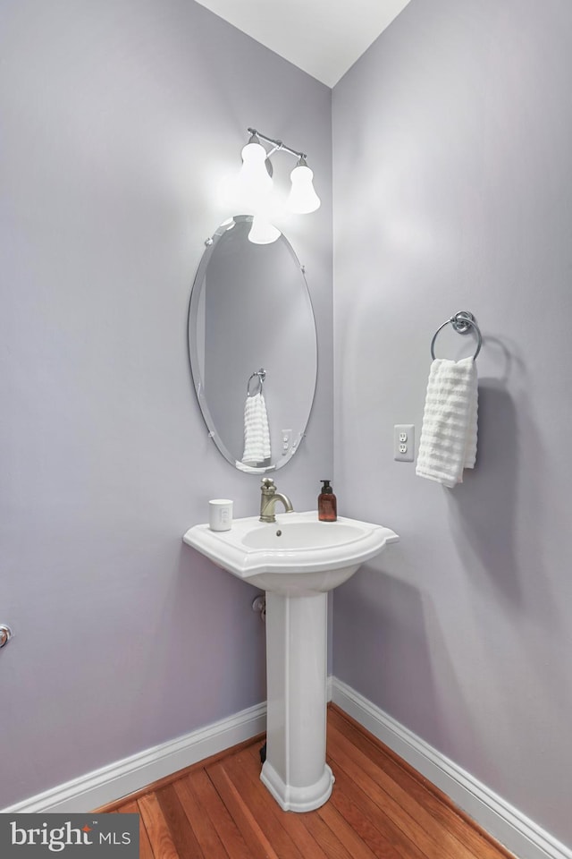 bathroom featuring hardwood / wood-style flooring