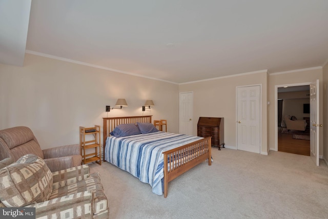 carpeted bedroom featuring ornamental molding