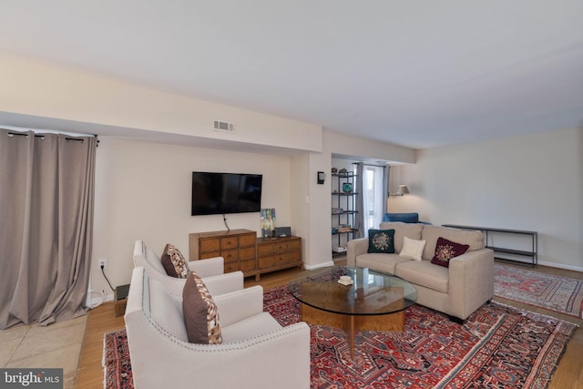 living room with light hardwood / wood-style floors