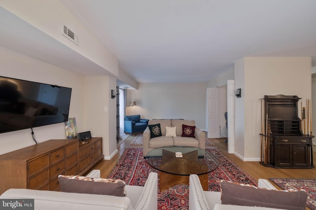 living room with light wood-type flooring