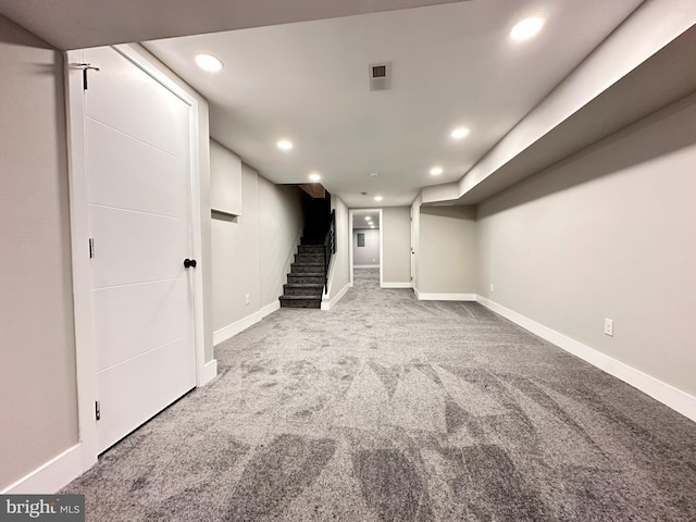 basement with light colored carpet