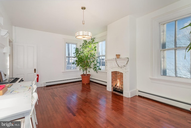 interior space featuring dark hardwood / wood-style floors and a baseboard radiator