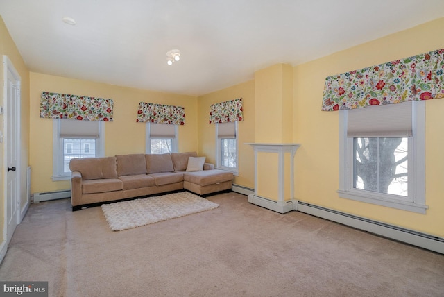 living room featuring light carpet and baseboard heating