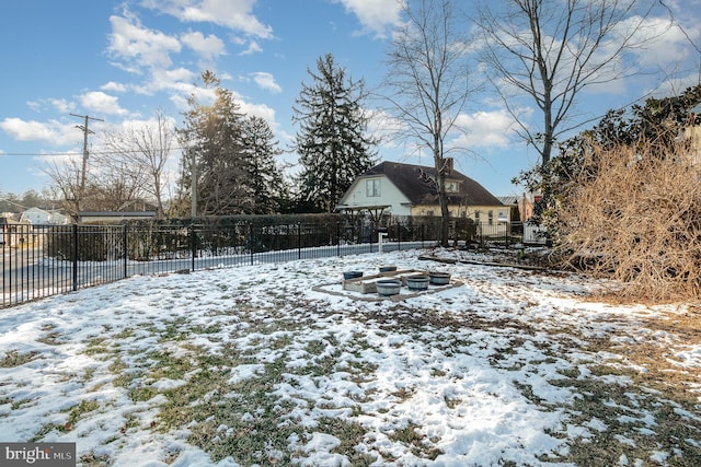 view of yard covered in snow