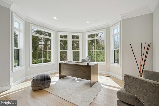 sunroom / solarium featuring a healthy amount of sunlight