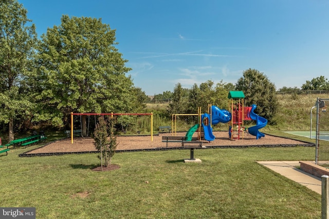 view of jungle gym with a lawn