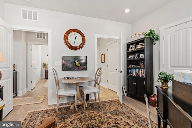 dining room with light hardwood / wood-style floors