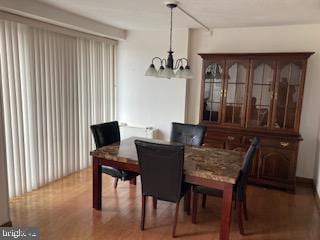 dining space featuring a chandelier