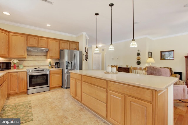 kitchen with backsplash, stainless steel appliances, crown molding, a kitchen island, and hanging light fixtures