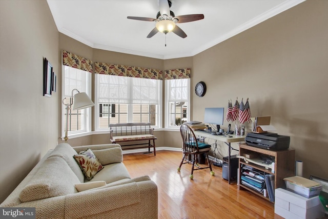 home office featuring hardwood / wood-style floors, ceiling fan, and ornamental molding