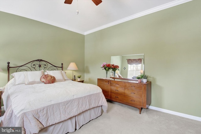 bedroom with ceiling fan, light colored carpet, and ornamental molding