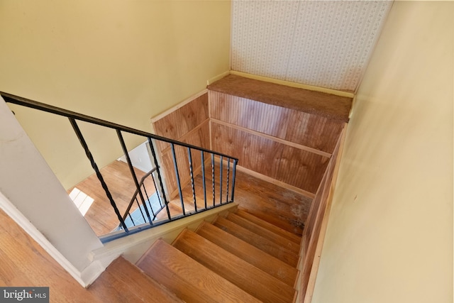 stairway with wood-type flooring