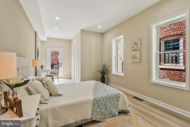 bedroom featuring light hardwood / wood-style floors