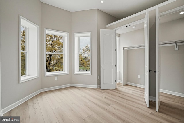 unfurnished bedroom featuring light hardwood / wood-style flooring