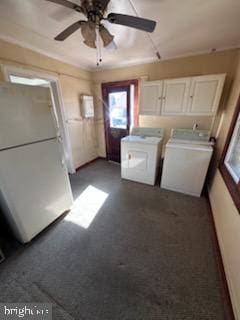 laundry room with dark carpet, cabinets, ceiling fan, and washing machine and clothes dryer