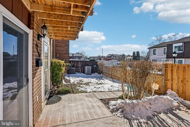 view of snow covered patio