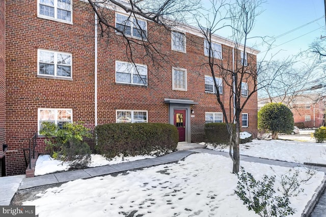 view of snow covered building