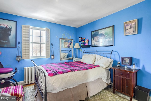 bedroom with radiator heating unit