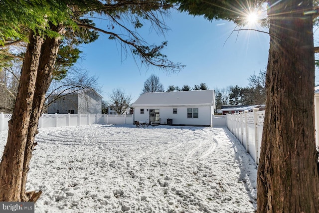 view of snow covered property