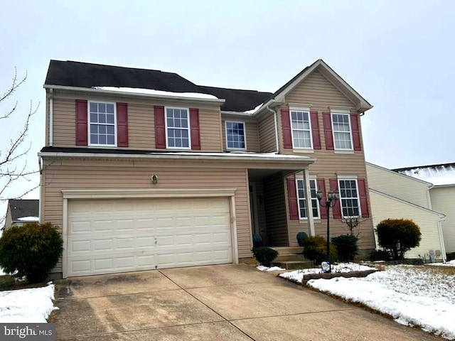 view of front of home with a garage