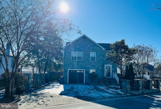 view of front of property featuring a garage