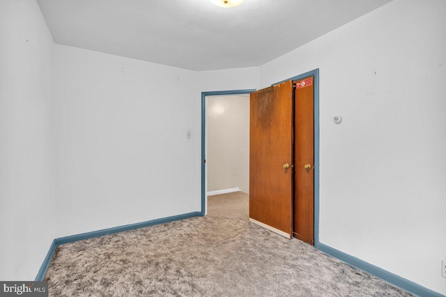 spare room with carpet flooring