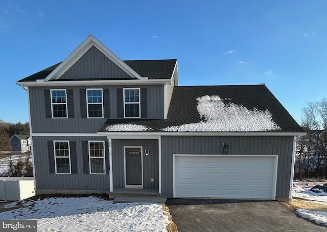 view of front property with a garage