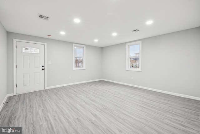 interior space with light hardwood / wood-style floors