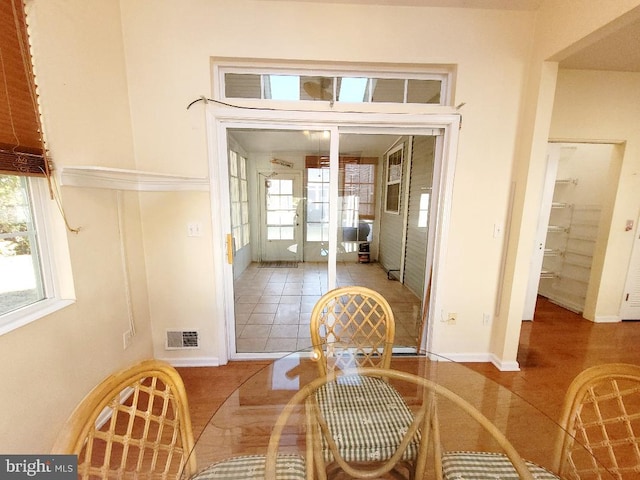 interior space featuring french doors and plenty of natural light