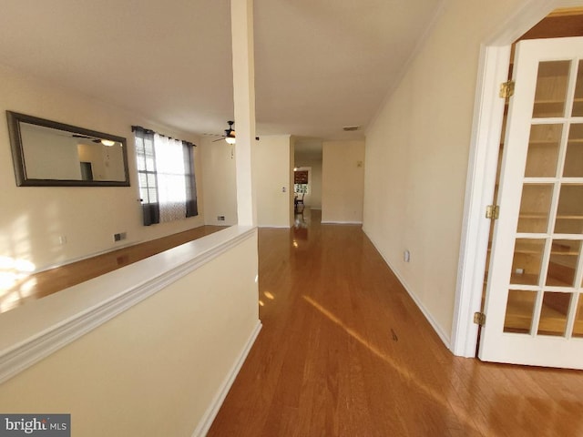 hallway featuring hardwood / wood-style floors