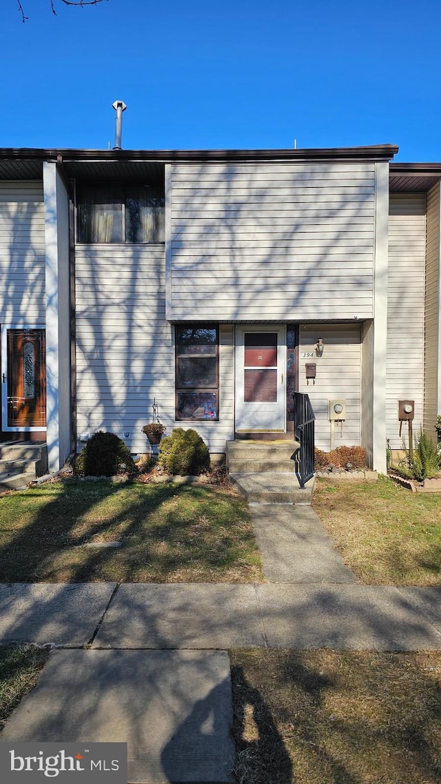 exterior space with a yard