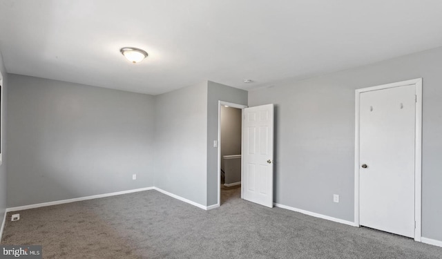 unfurnished bedroom featuring carpet floors